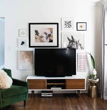 The dresser can hold a standard sized tv thanks to its relatively large countertop. Designing With Your Tv A Media Console Roundup Emily Henderson