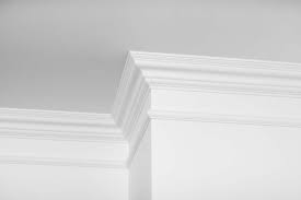 Your eyes follow the line of white paint where the ceiling and wall meet. Does Crown Molding Make A Room Look Bigger Or Smaller