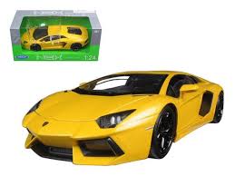 The scale of a diecast modellamborghini reventon is in the following format: Welly 24033y Lamborghini Aventador Lp700 4 Yellow 1 24 Diecast Model Car Buy Online In Angola At Angola Desertcart Com Productid 114196766
