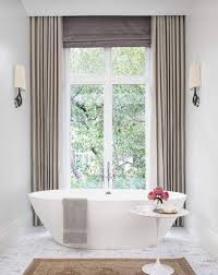 Sounds pretty basic, does it not? Ceiling Mounted Curtain Tracks Bathroom Window Treatments Bathroom Window Curtains Bathroom Design