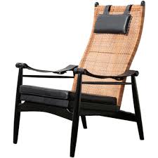 Check out our mid century rattan armchair selection for the very best in unique or custom, handmade pieces from our chairs & ottomans shops. Muttendam Mid Century Rattan And Leather Armed Lounge Chair Lounge Chair Design Furniture Upholstered Seating