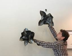 Magnolias hand forged in David's New Orleans studio. Inspired by nature…