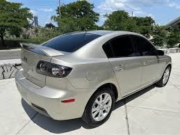 Image result for Shimmering Sand 2007 Mazda3