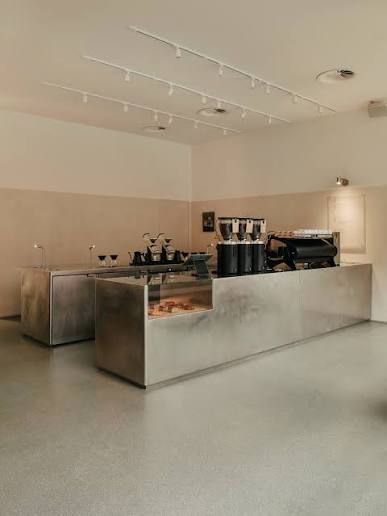 A custom stainless steel bar forms the focal point of Special Guests, placing coffee at the forefront of the guest experience. The menu showcases a diverse range of coffees, from the house