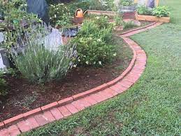 Stretch the line to the next stake, wind it around and secure it, too. Diy Brick Garden Edging In A Weekend The Kitchen Garten