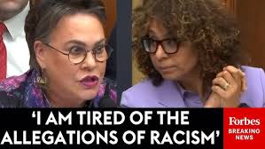 Del. Stacey Plaskett Throws Document at Rep. Mike Johnson.