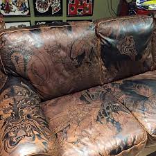 Who Wouldn T Want This Tattooed Sofa In Their Home Tattoo Shop Decor Traditional Japanese Tattoo Meanings Tattoo Studio Interior