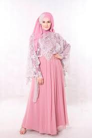 Home » busana wanita » model busana wanita masa kini. Lihat Model Busana Masa Kini 8 Contoh Baju Setelan Busana Muslim Wanita Trend Masa Kini Hijab Dengan Warna Cokelat Muda Dengan Model Simple Ekor Samping Karena Ujung Satunya Dilipatkan