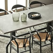Industrial style crank base dining tables these are truly a statement piece built from cast iron and solid steel with working cranks to adjust the dining table. 63 Industrial Dining Table Concrete Gray Table Top Solid Wood Metal Base