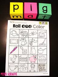 You can add the milk lids to make it 3d or just have kids place pom poms directly on the paper. Miss Giraffe S Class Cvc Words Roll