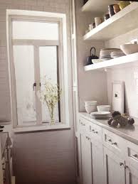 The home's walls were painted in white dove, allowing the collections of art, books, and vintage furniture to take center stage. Benjamin Moore Dove Wing Countertops Are Caeserstone Update Cabinets Dove Wing Benjamin Moore Interior
