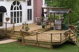 pressure treated lumber decks atlanta decking and fence building a deck decks backyard tiered deck