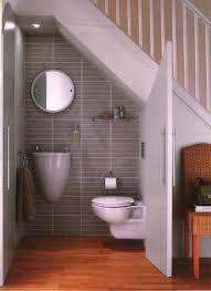 Beyond Under Stairs Storage Design Ideas Wine Rack Cupboards Nook Tiny Bathroom Sink Bathroom Under Stairs Small Bathroom