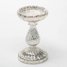 The way this lotus flower candle holder for pillar candles reflects light is just beautiful. Richland 7 Ribbed Unique Mercury Glass Pillar Candle Holder Quick Candles
