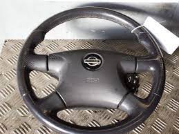 Place the steering wheel puller on the column so that the center of the puller is where the nut on the steering wheel was, and then thread the bolts that come with the puller through the puller itself and into the holes to the sides of the center nut on the wheel, using a 3/8. Steering Wheel Nissan Almera Tino 1 8 16v 6019211