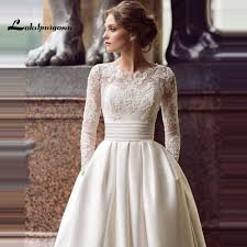 Modest Long Sleeve Wedding Dresses Turkey Scoop Satin Appliqued A Line Bridal Gown With Pockets Vestidos De Novia Www Di 2020 Gaun Perkawinan Gaun Pengantin Sederhana Gaun Pengantin Brokat