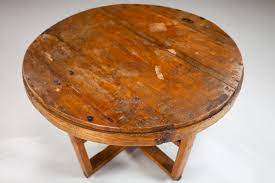 A coffee table is a low table designed to be placed in a sitting area for convenient support of beverages, remote controls, magazines, books (especially large, illustrated coffee table books), decorative objects, and other small items. British Colonial Wood Art Deco Side Coffee Table India 1920s Early 20th Century Art Deco Items By Category European Antiques Decorative