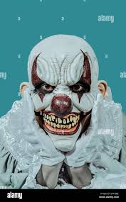 mad bald evil clown, wearing a costume ...