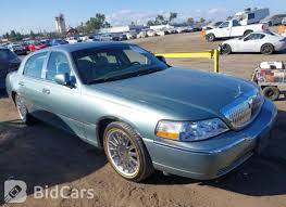 Image result for Light Ice Blue 2005 Town Car