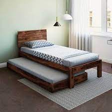 Single Beds Boston Single Bed Teak Finish With Trundle By Urban Ladder Singlebed Simple Bed Simple Bed Designs Bed Furniture Design