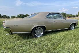 Image result for Martinique Bronze 1966 GTO