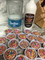 1 cup skim milk 1 cup birthday cake flavored vodka 1 package of instant pudding mix (chocolate or vanilla) 1 tub of fat free cool whip 1 can reddiwip sprinkles of your choice mix milk, vodka and pudding mix together until smooth. Chocolate Cake Pudding Shots Pudding Shot Madness