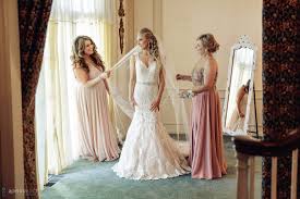 Because beach and garden weddings tend to be less formal than weddings in other venues, you may want to take a look at florals or a happy print as an option for your dress. Colonial Style Wedding At Grace Vineyards Wedding Photo Gallery
