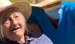 Moment son reunited with his mother in Devon care home 'drive through'