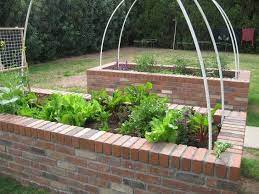 Line the wall with landscaping fabric and fill in with enough soil to level off the garden. Corobrik How To Build A Raised Brick Vegetable Bed Sa Decor Design