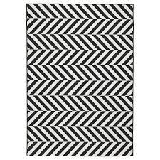 The bold stripe remora area rug infuses both indoor and outdoor spaces with a classic colorway of blue and ivory. Skarrild Rug Flatwoven In Outdoor White Black Ikea
