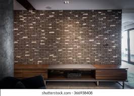 While the days of our ancestors, the tribe's families gathered. Wooden Tv Unit Againstbrick Wall Modern Stock Photo Edit Now 366938408