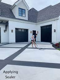To properly paint a concrete driveway, you must first ensure that it is completely cleared and clean. Adding Curb Appeal With A Painted Driveway