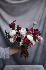 Bridal Bouquet Featuring Pale And Burgundy Peonies Ranunculus And Amnesia Roses With Green Ranunculus Wedding Bouquet Ranunculus Wedding Peony Bouquet Wedding