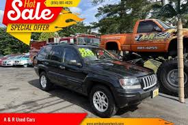 Image result for Brilliant Black 2004 Jeep