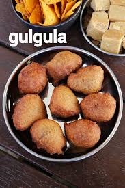 Gulgula Recipe Goolgoola Recipe Gulgule Banane Ki Recipe In 2020 Savory Snack Recipes Indian Snack Recipes Indian Dessert Recipes