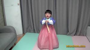 Happy New Year 새해 복 많이 받으세요 Yerin Park A Little Girl From South Korea Practices A Traditional Luna Lunar New Year Greetings Traditional Bow Korean Hanbok