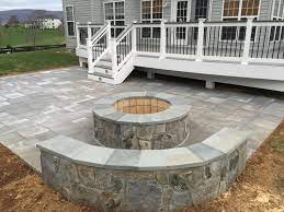 Maybe you would like to learn more about one of these? A Beautiful Paver Patio With Stone Seating Walls And A Fire Pit Behind It Is A Trex Deck With Trex Handr Patio Deck Designs Backyard Patio Deck Backyard Patio