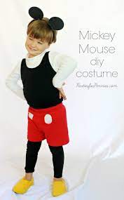 For the cutest diy minnie mouse costume for your kid, simply tie a yellow ribbon sash around a red polka dot dress, and finish it off with some white gloves, black ballet flats, and the classic mouse ears. Diy Halloween Costumes Parties For Pennies