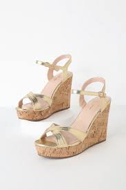 Strut your stuff in gold wedge heels. Nixie Gold Wedge Sandals Lace Up Espadrille Wedges Wedge Sandals Gold Slides Sandals