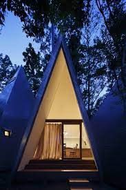 His tipi from sacramento tent manufacturer, goodwin cole, housed a bed covered with sheepskins, a small dresser for dale said he chose the tipi, rather than a tent or trailer, for the romantic aspect of it. Nasu Tepee A Tipi Shaped House By Hiroshi Nakamura Nap