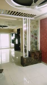 Amazing Tips To Design Your Entrance Foyer Living Room Partition Design Room Partition Designs Wall Partition Design