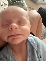 How to break the cycle of overeating and overtiredness in a 7-week-old baby?