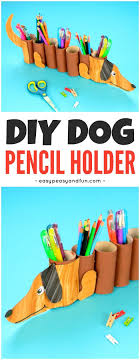 Here's some fun and easy dog crafts for kids and adults to make, including dog craft projects using paper, cups, fabric, socks, cds, and tin cans. Dog Paper Roll Pencil Holder Dog Crafts Diy Dog Stuff Pencil Holder