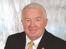 State issues tax warrant against commissioner