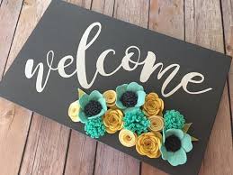 It is just three wood planks glued together and secured using another small plank and some finishing nails. This Item Is Unavailable Etsy Welcome Wood Sign Felt Flowers Flower Crafts