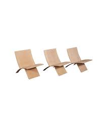 Design 101 19 Iconic Chairs Everyone Should Know White Leather Dining Chairs Wood Folding Chair Chair Reupholstery
