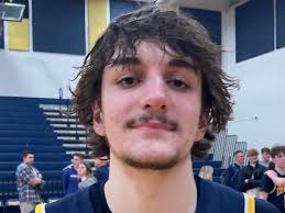 Boys basketball roundup: DeWitt, Portland, East Lansing among winners