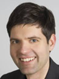 Sphericity and roundness computation for particles using the extreme  vertices model