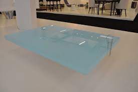 This custom 38 table includes plenty of room for snacks & drinks, general decor, etc. The Sleek Stunning Swimming Pool Coffee Table Design