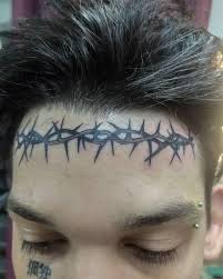 Image result for quirky pylon forehead tattoo